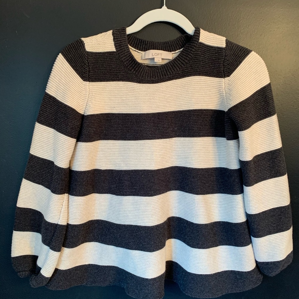 Woman’s striped sweater